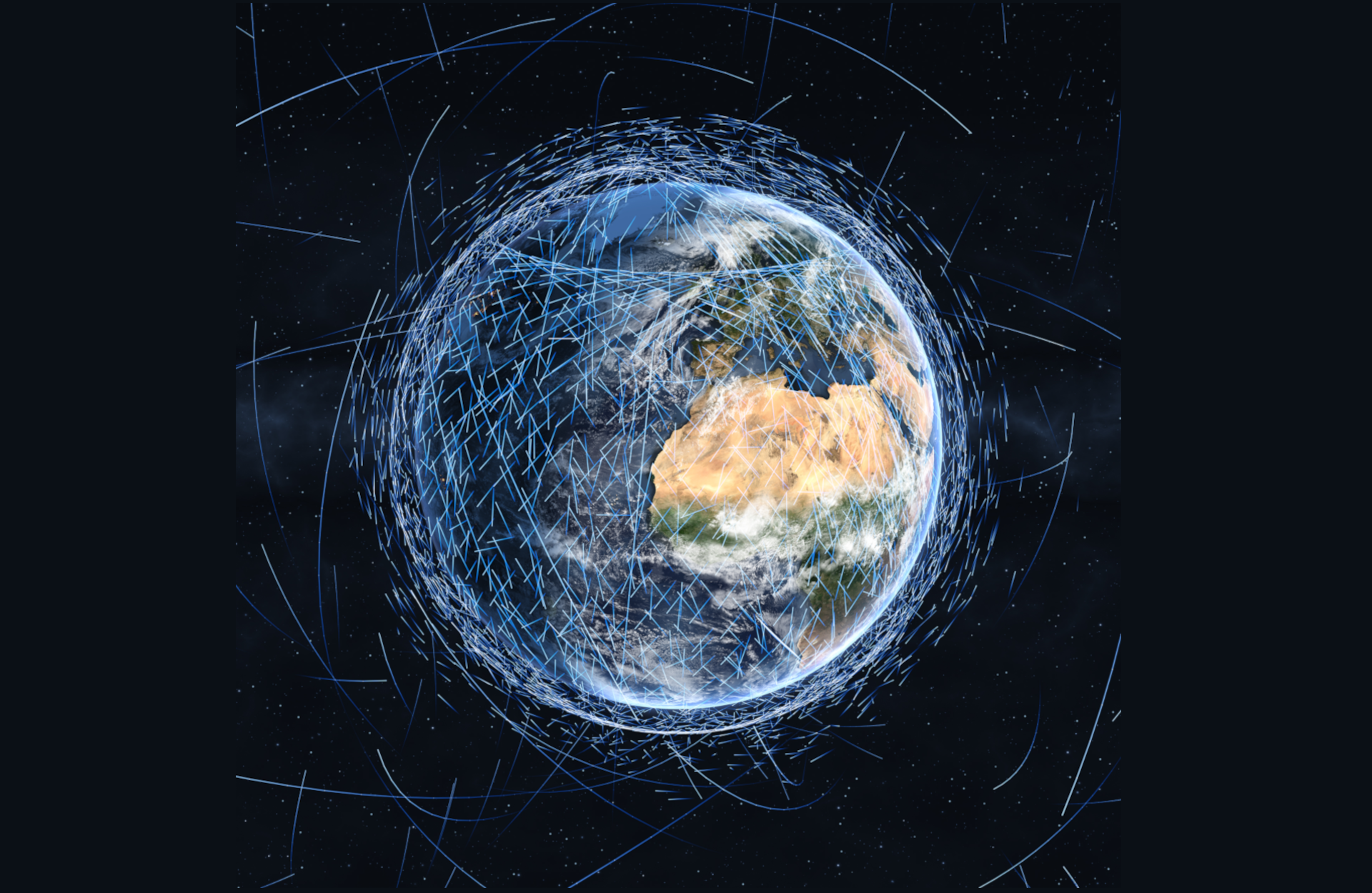 Der blaue Planet wird von vielen Satelliten-Flugbahnen umringt.