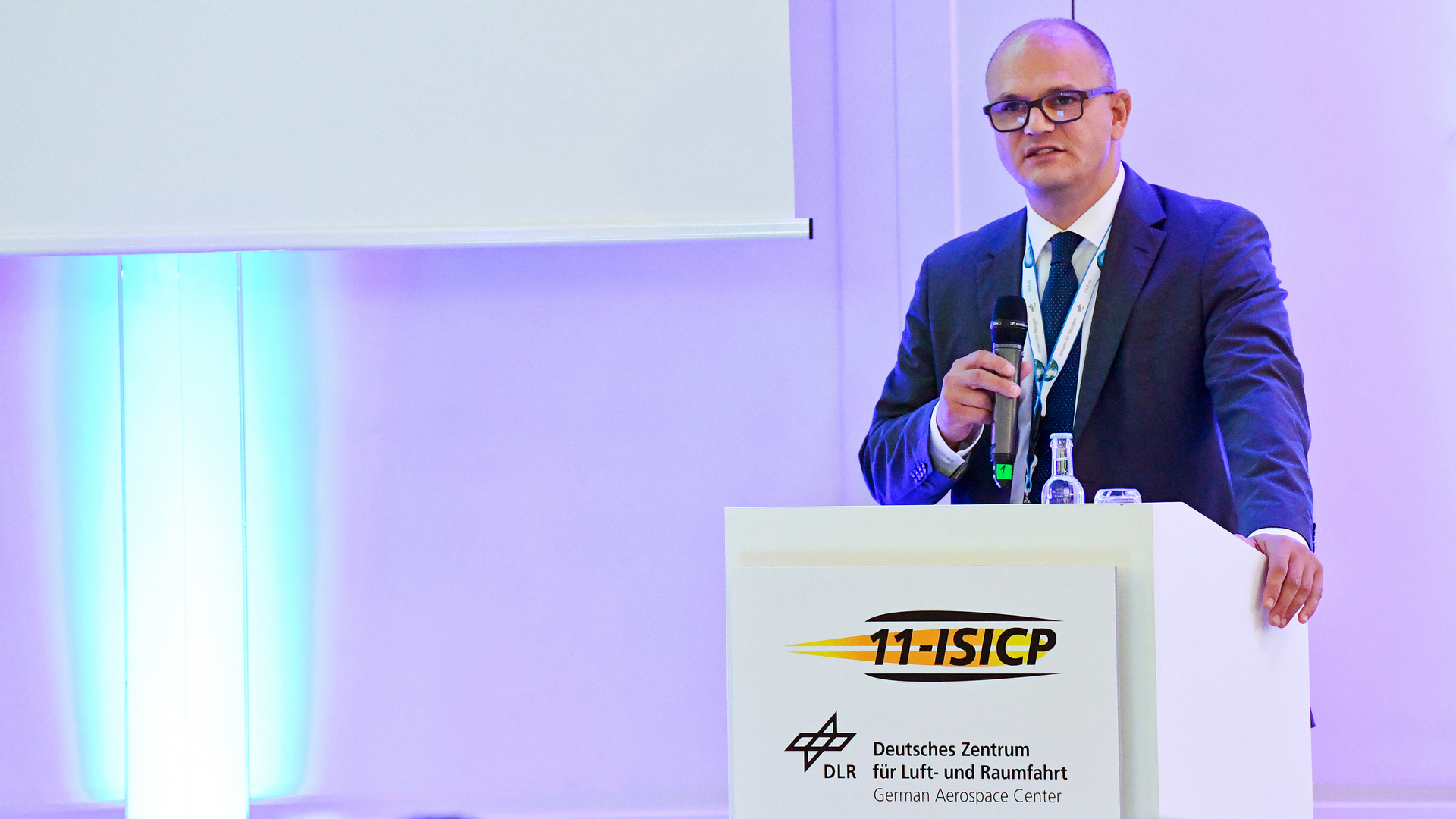 Grußwort an die Teilnehmer des Internationalen Symposiums