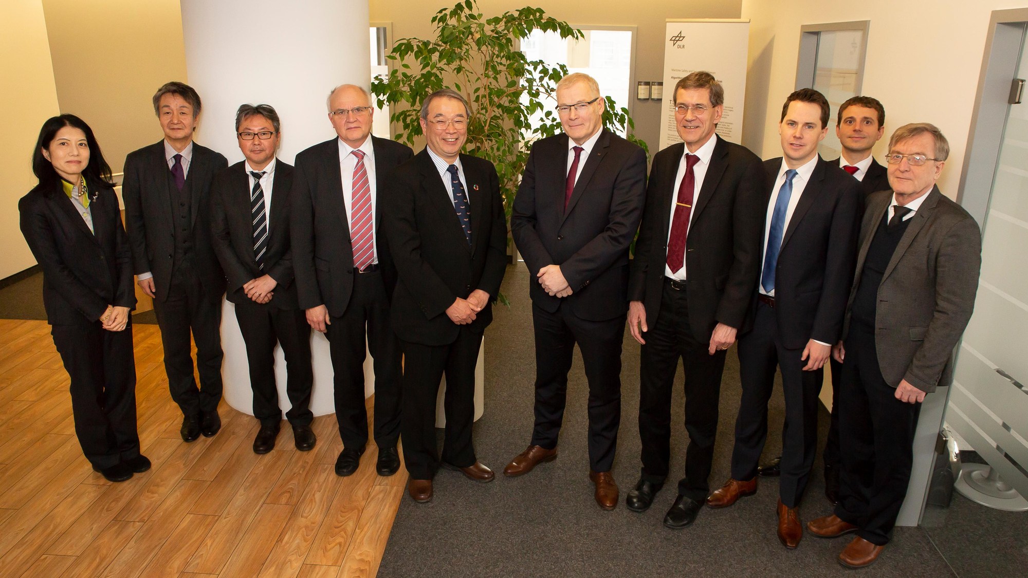 NEC- und DLR-Delegation