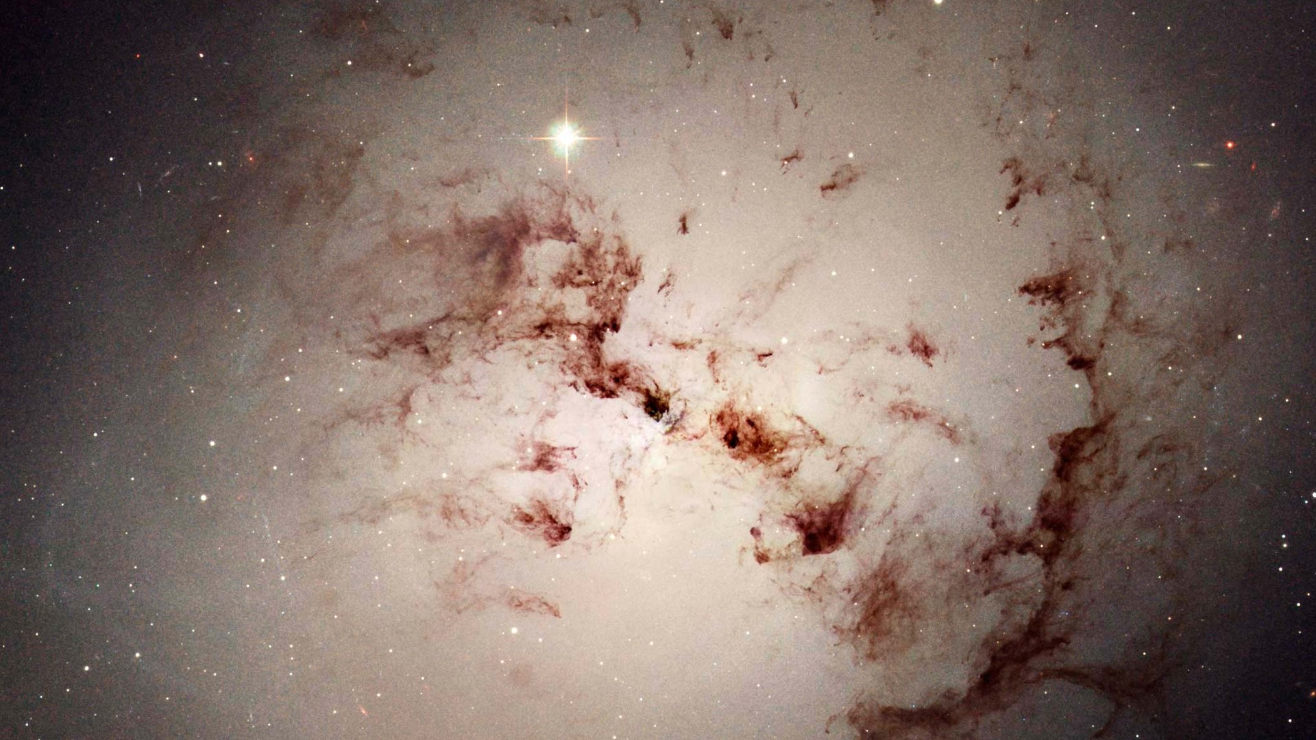 Teilchen schließen sich zu Atomen zusammen.