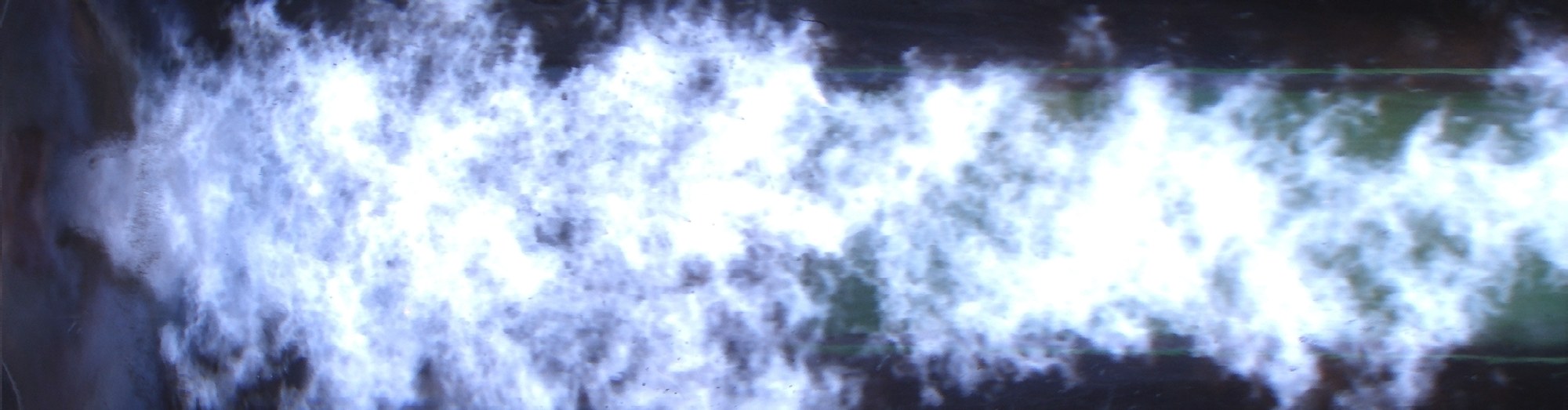 Das Bild zeigt eine blaue Flamme.