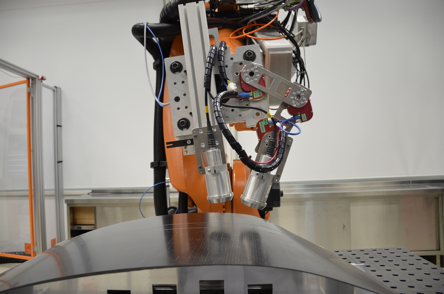 Air-coupled ultrasonic inspection of a skin element