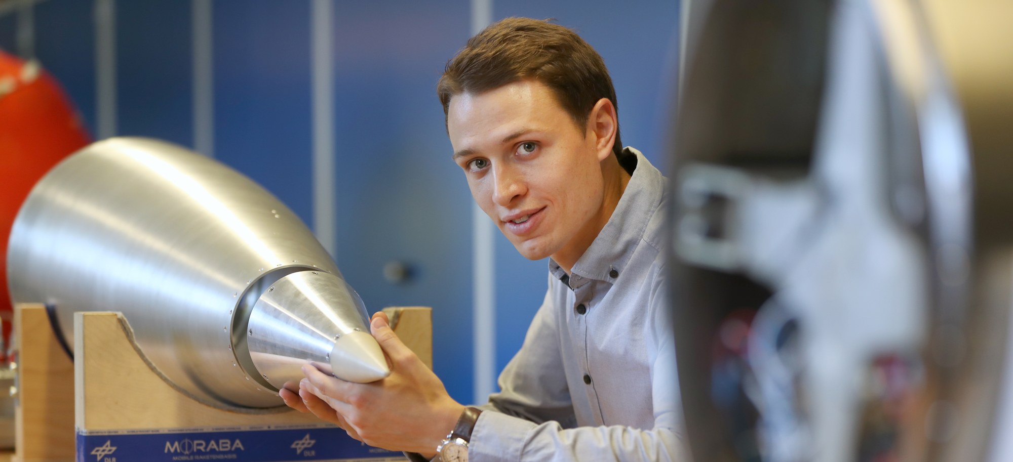 Young engineer working on a rocket model.
