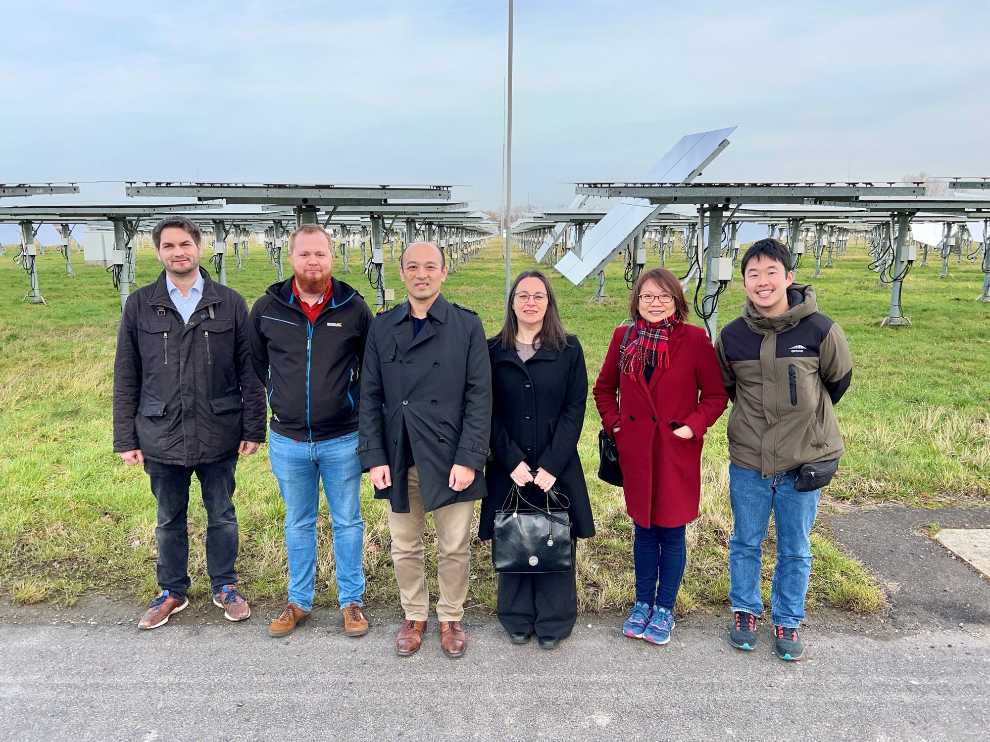 AIST researchers in front of the mirror field in Jülich