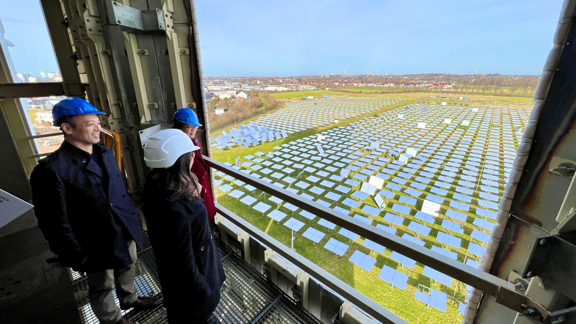 Researchers look from the 6th floor of the solar tower at the mirror field with over 2000 heliostats.