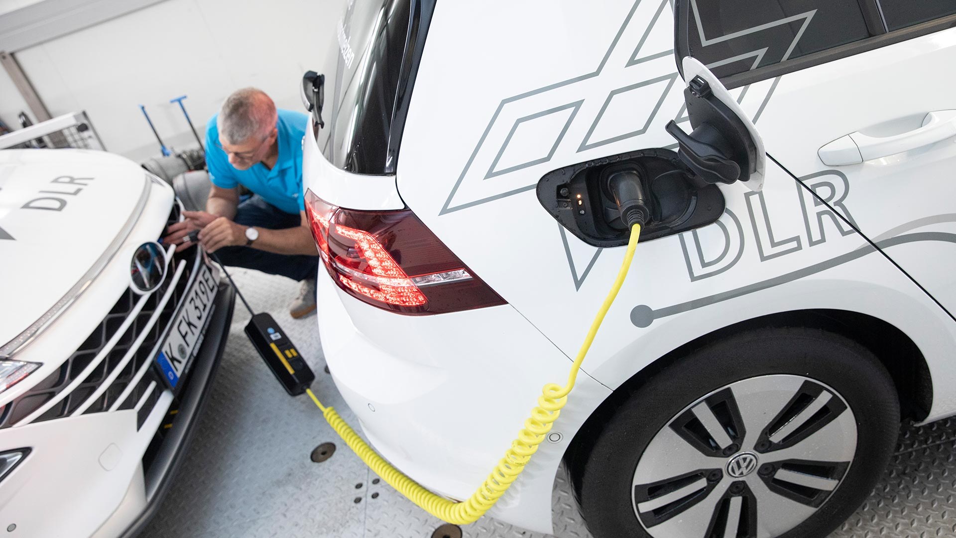 Man with two vehicles