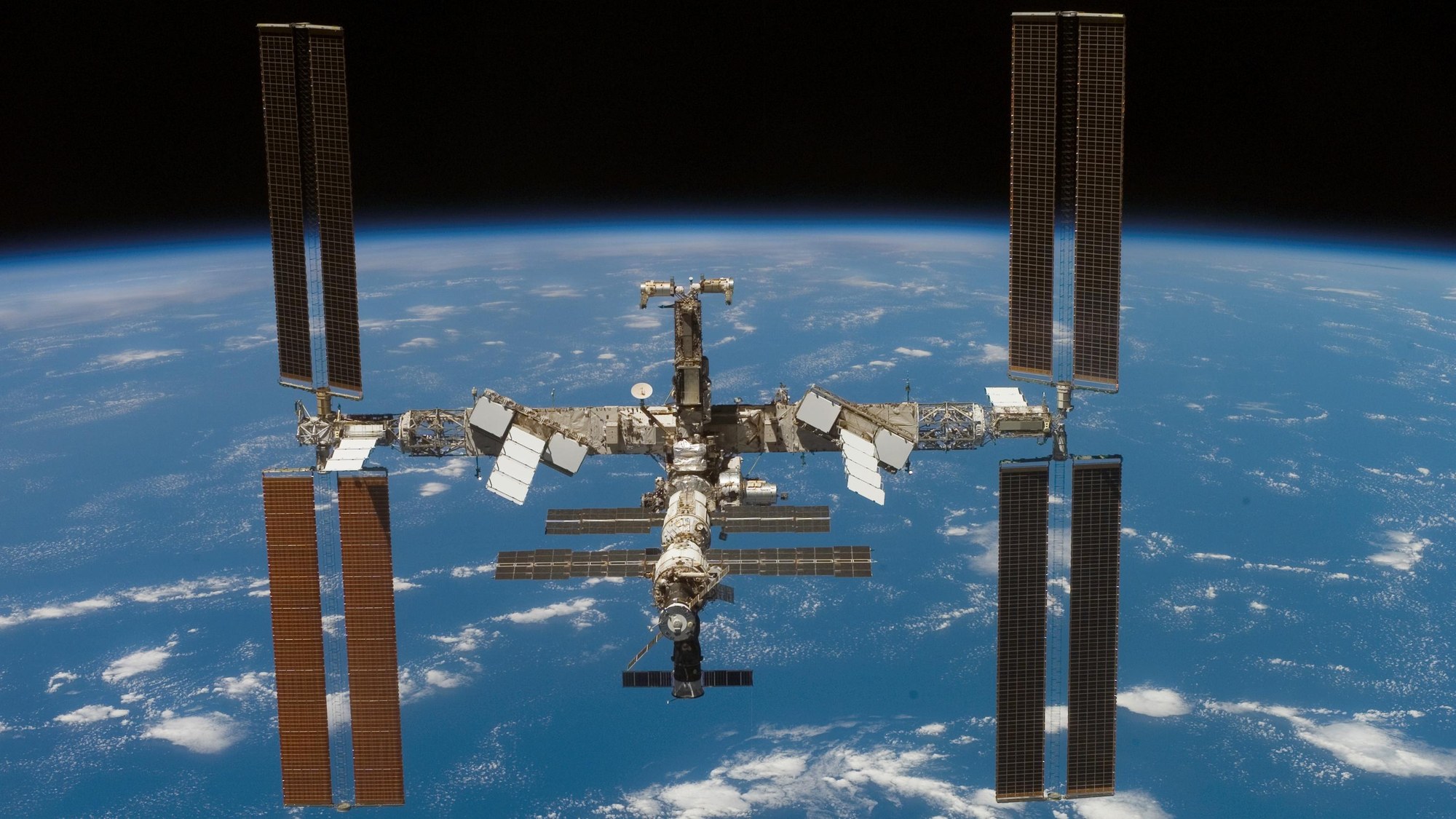ISS moves away from the Space Shuttle Atlantis, June 2007