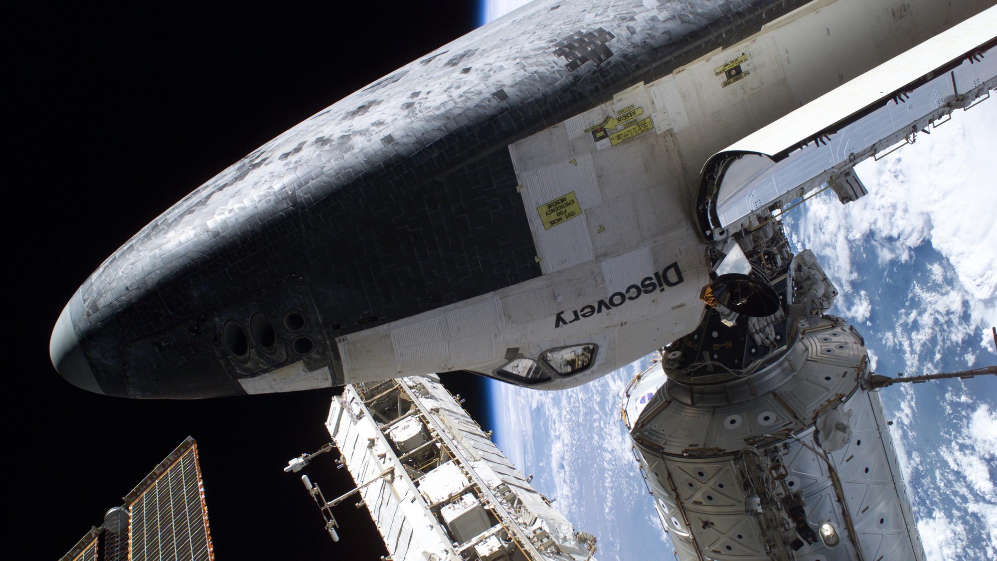 The Space Shuttle Discovery, docked to the Destiny laboratory of ISS, August 2005