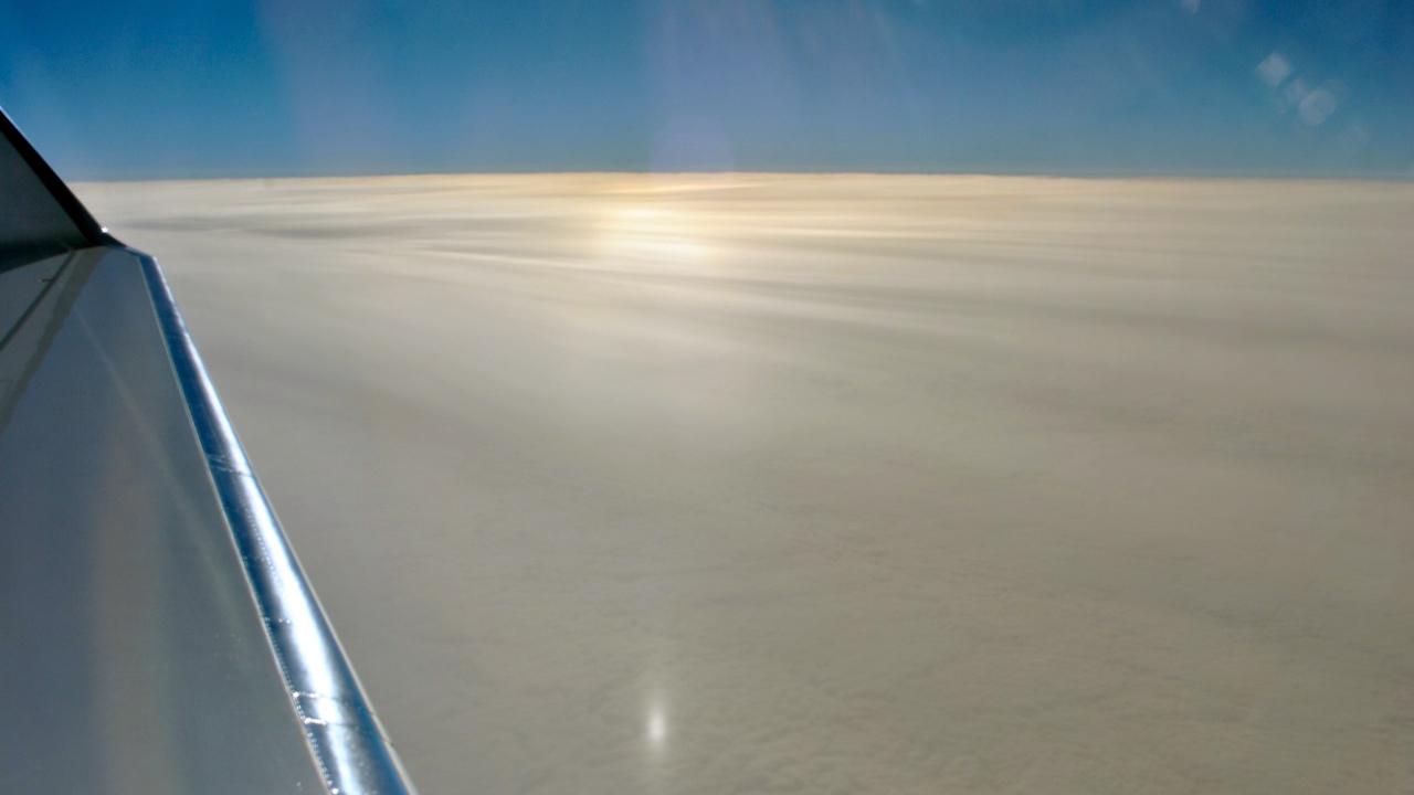 Clouds are formed by rising air masses over the Atlantic Ocean