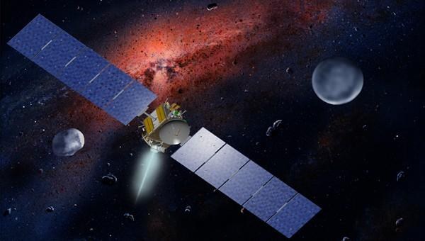 Dawn spacecraft with a nebula in the background