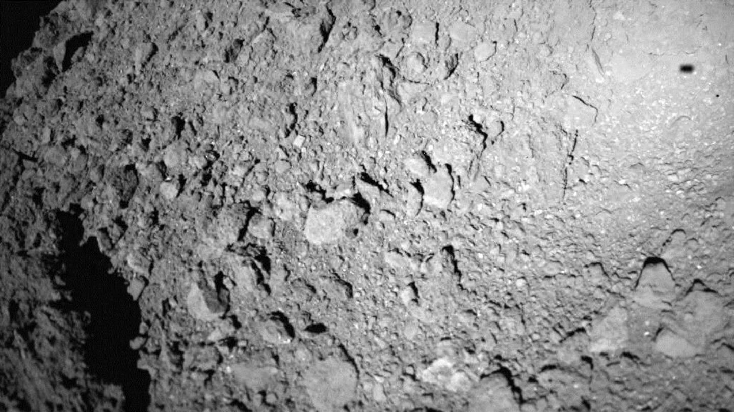Shadow of MASCOT over asteroid Ryugu