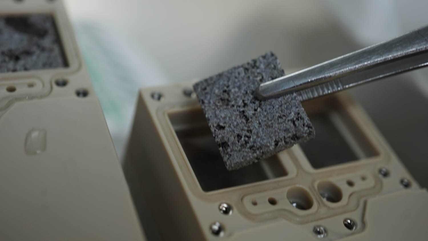 Integration of basalt discs inoculated with Bacillus subtilis spores