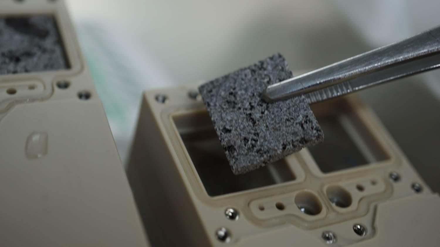 Integration of basalt discs inoculated with Bacillus subtilis spores