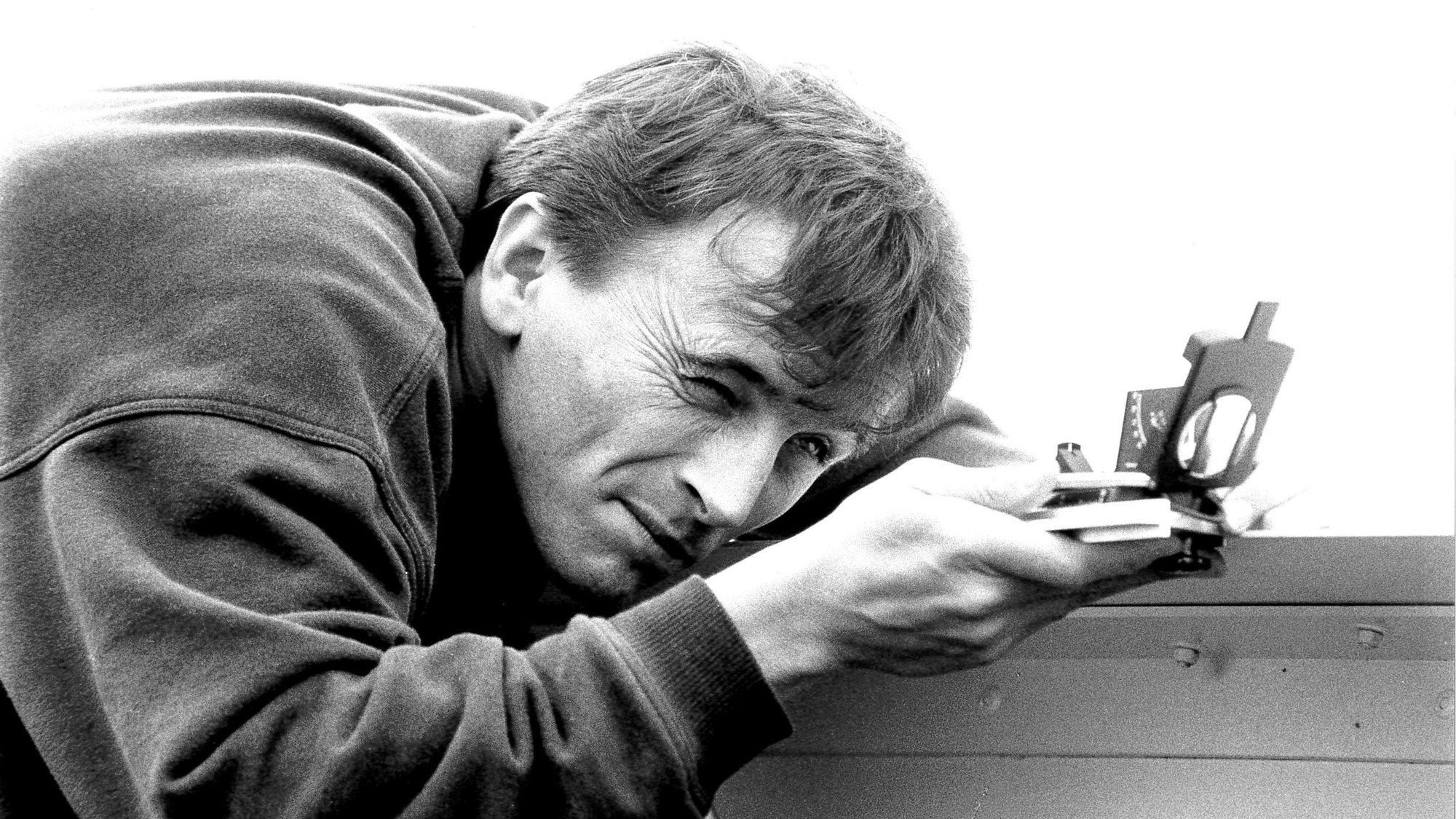 Manfred Zink aligning a corner reflector using a compass in 1994