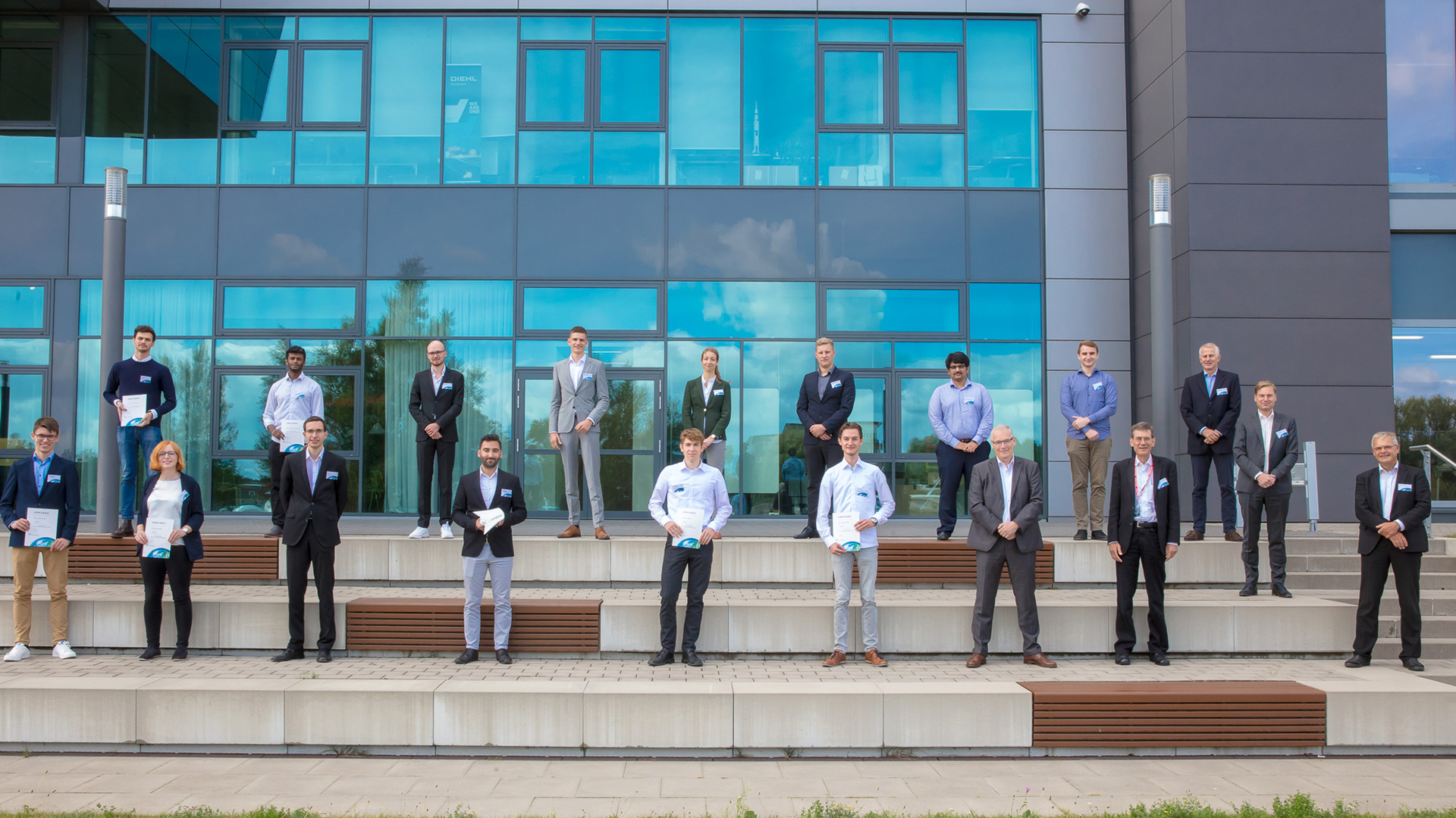 Group picture of all of the presenting team members with the jury