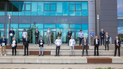 Group picture of all of the presenting team members with the jury