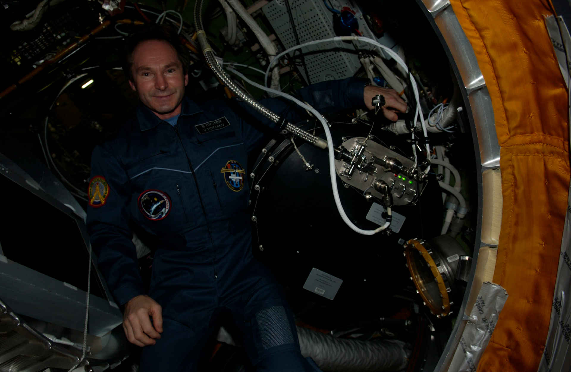 Cosmonaut Valeri Tokarev in January 2006 with the second 'PK-3 Plus' laboratory installed in the Russian Zvezda module