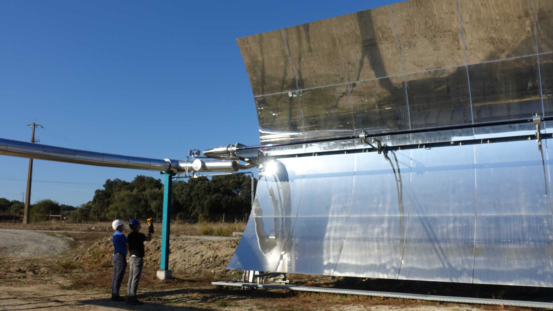 Project engineers check the surface temperatures of the pipelines