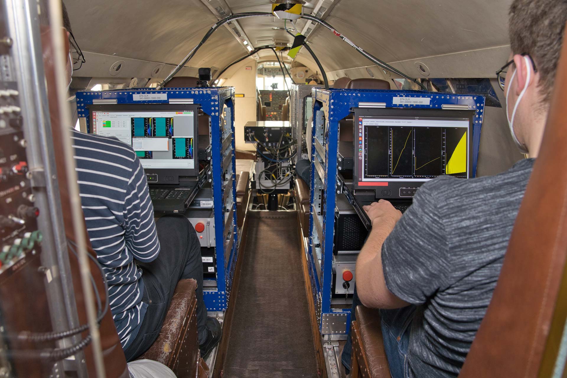 DLR researchers monitor systems and data aboard the Falcon