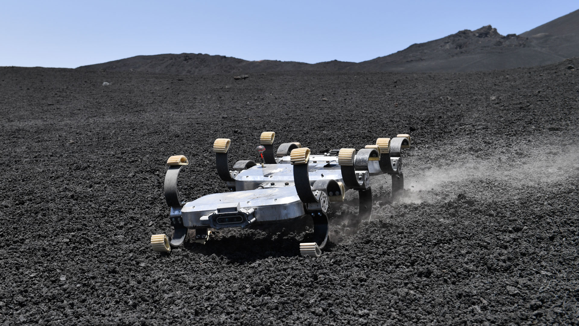 Scout rover in the lava landscape on Mount Etna