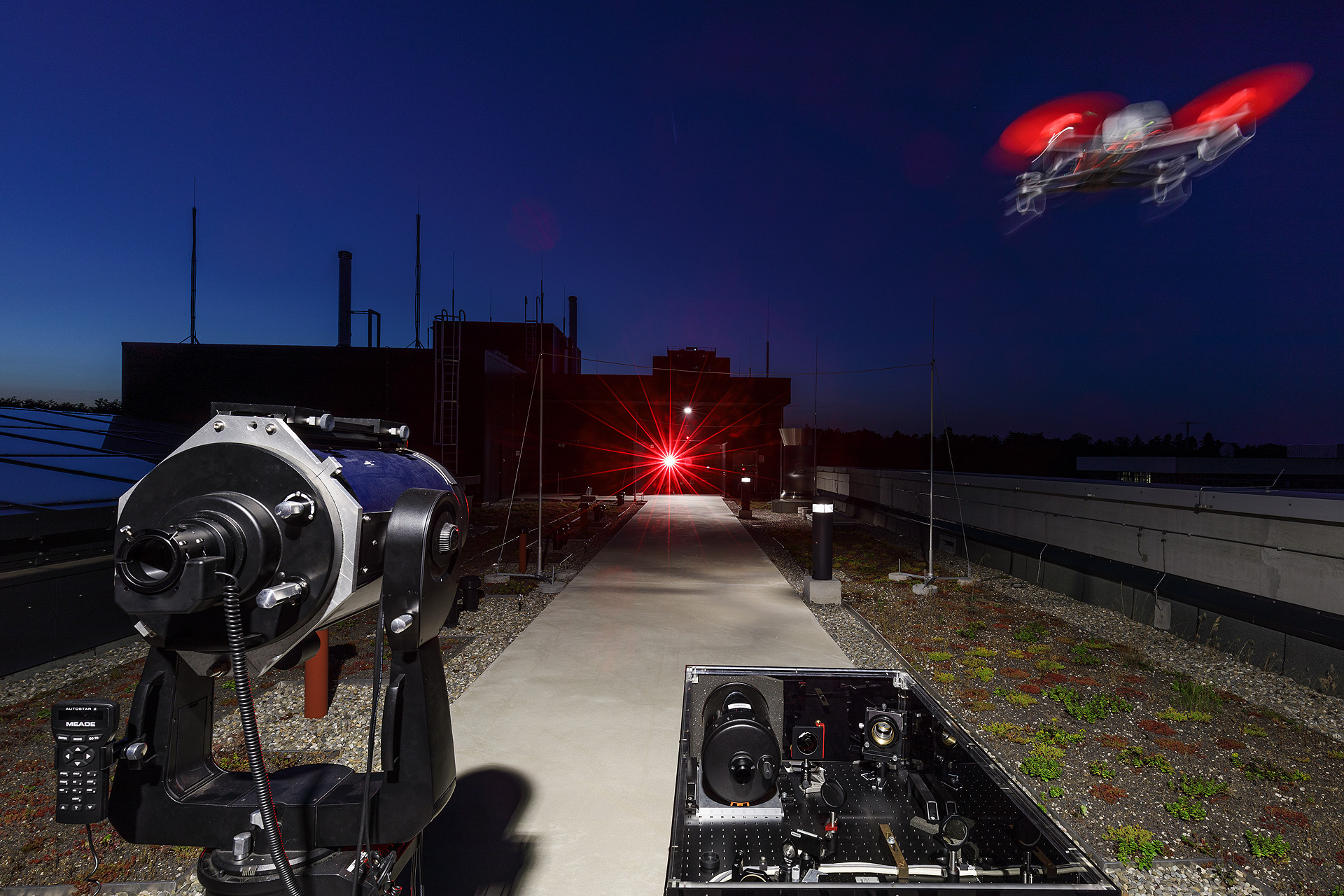 Test facility for tracking unmanned aerial vehicles using laser