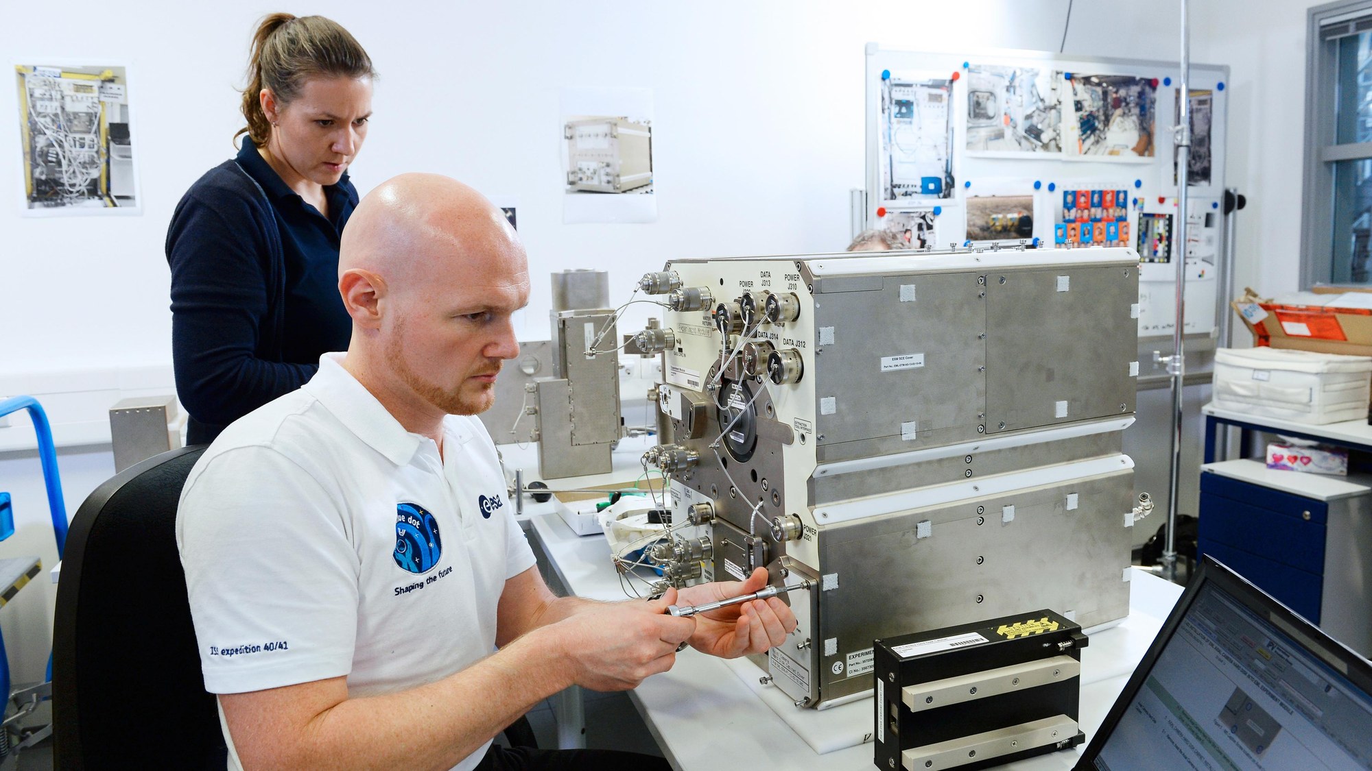 Alexander Gerst being trained on the functioning of the Electromagnetic Levitator (EML)