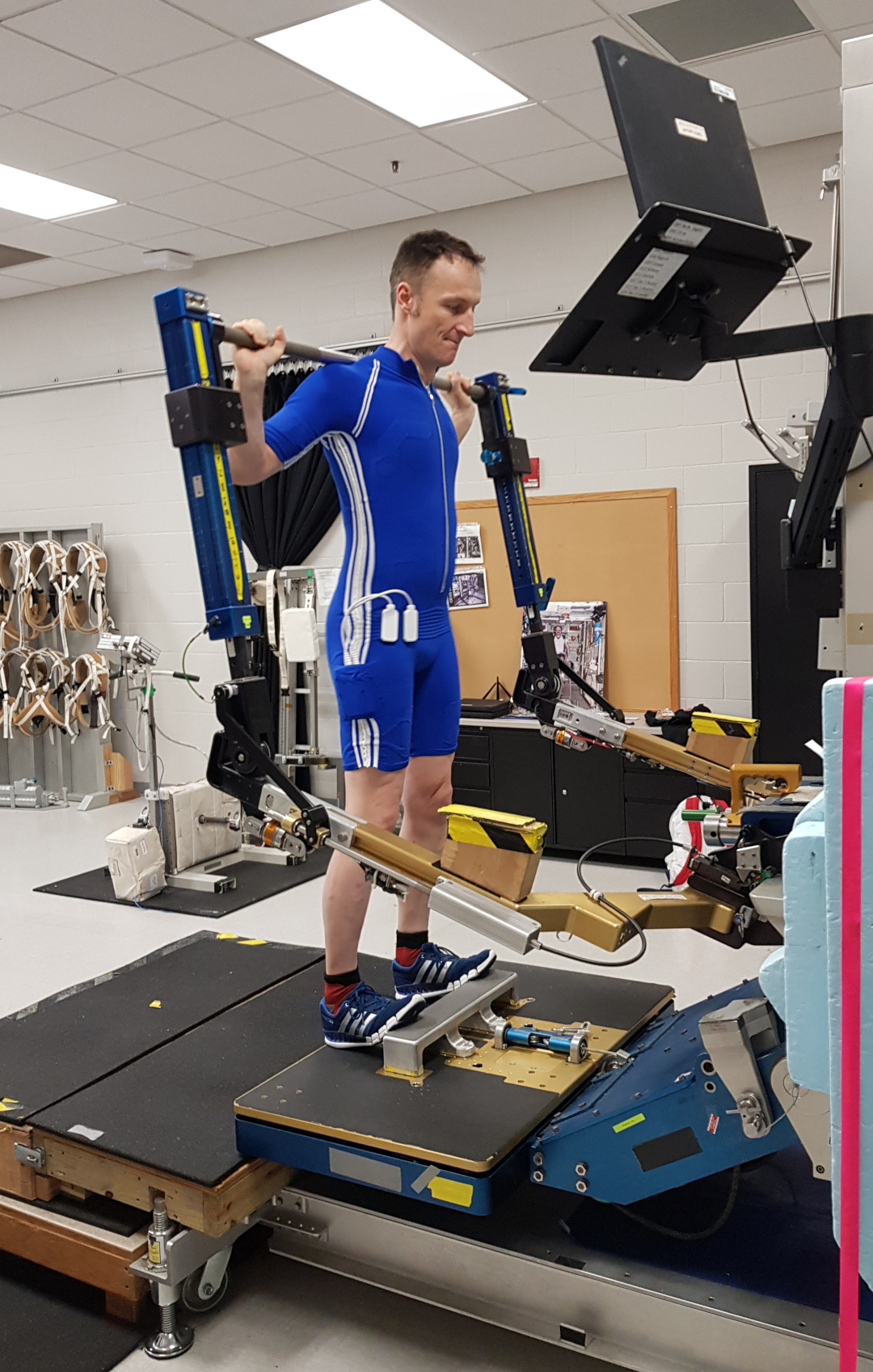 Matthias Maurer exercising in the EMS suit