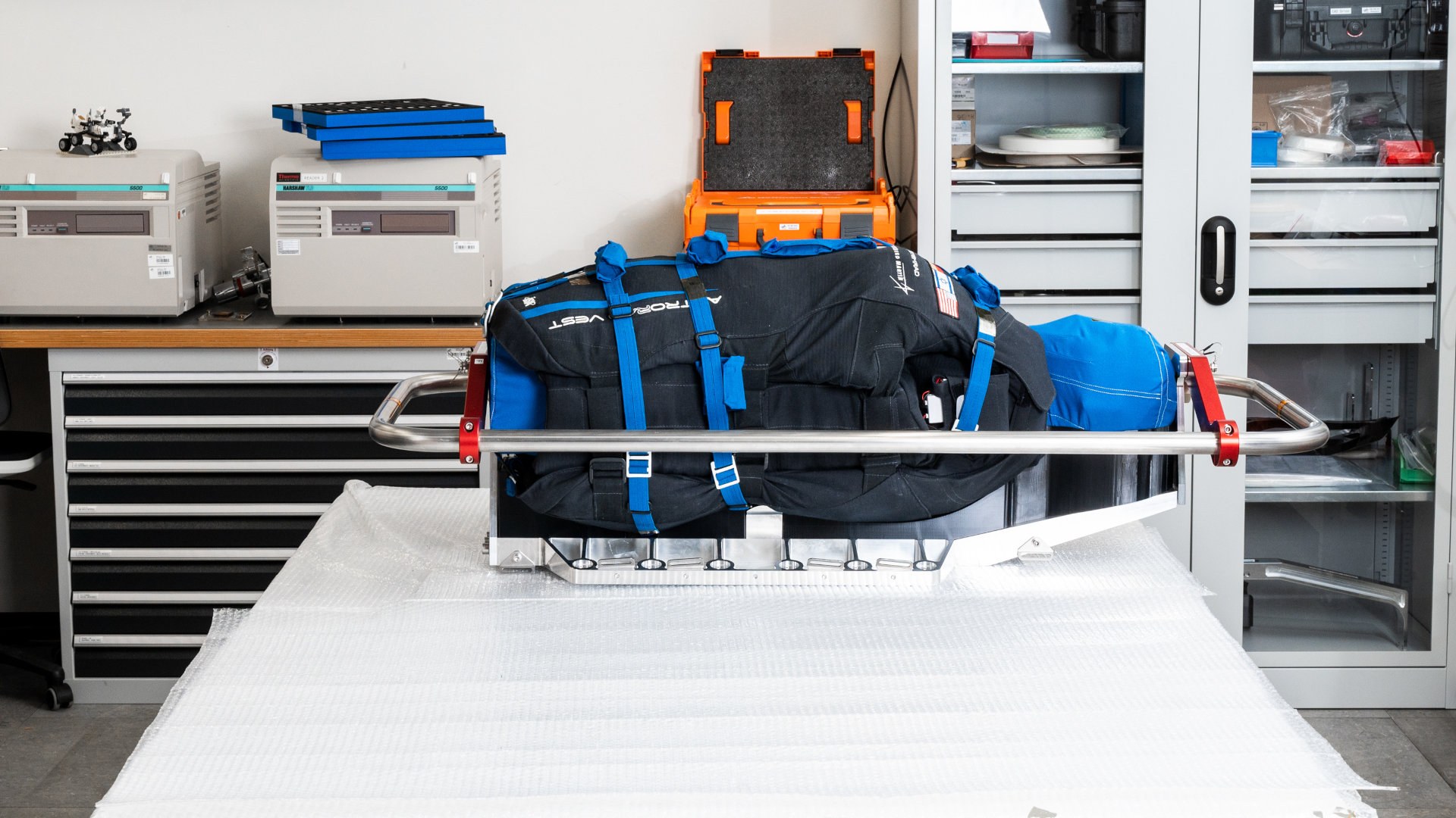 Zohar with vest in her seat