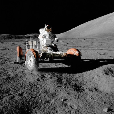 Apollo 17 Commander Eugene Cernan steering the two-seater lunar rover