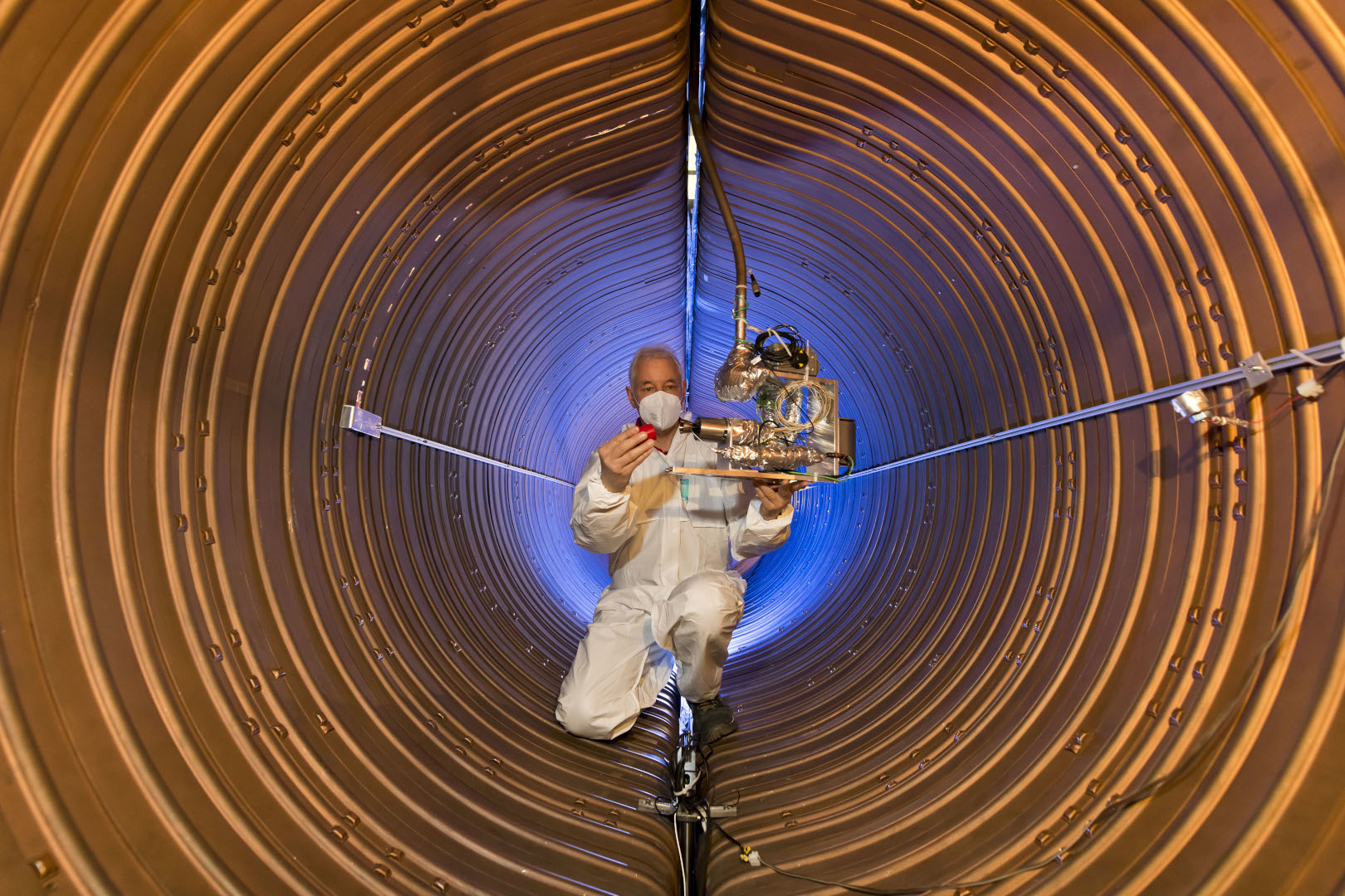 Researcher in the unique test facility