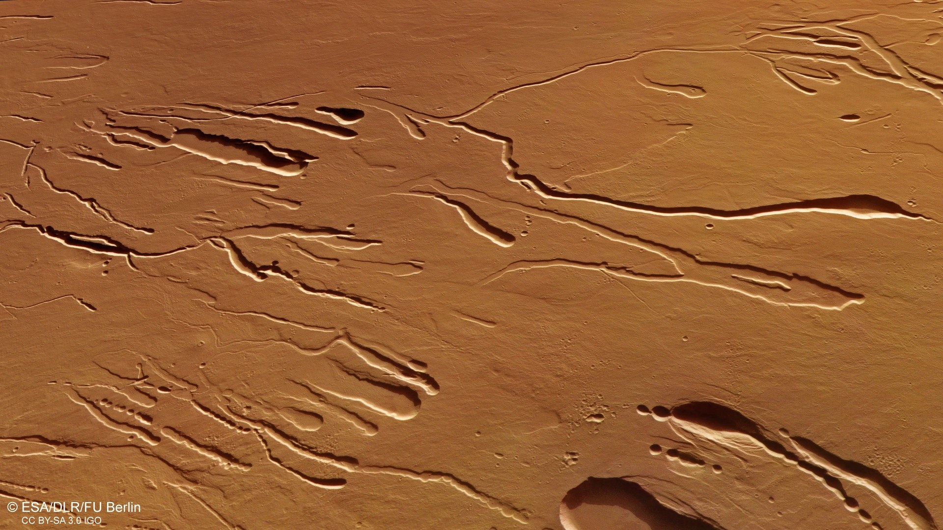Collapsed voids on the south-west flank of Ascraeus Mons