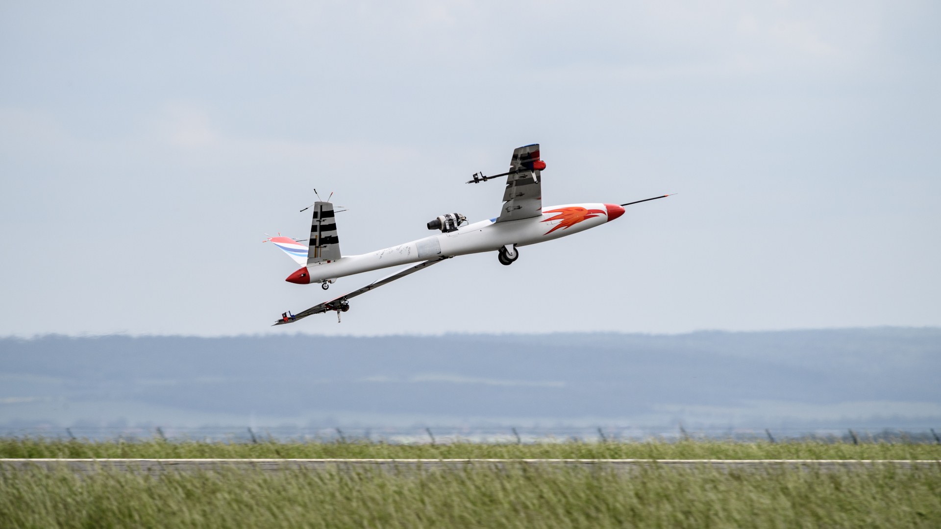 UAV with onboard active flutter suppression system