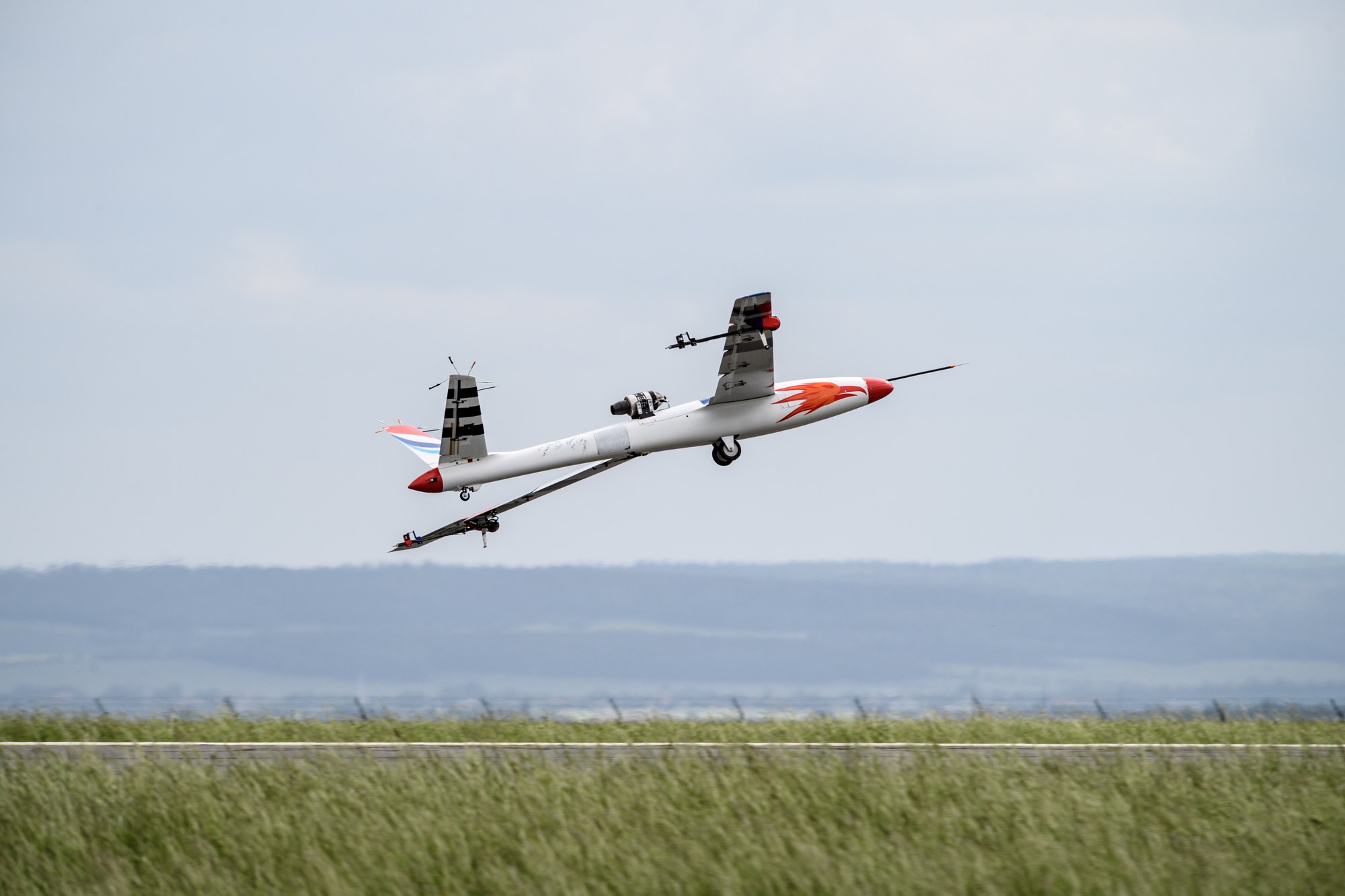 UAV with built-in active flutter suppression system