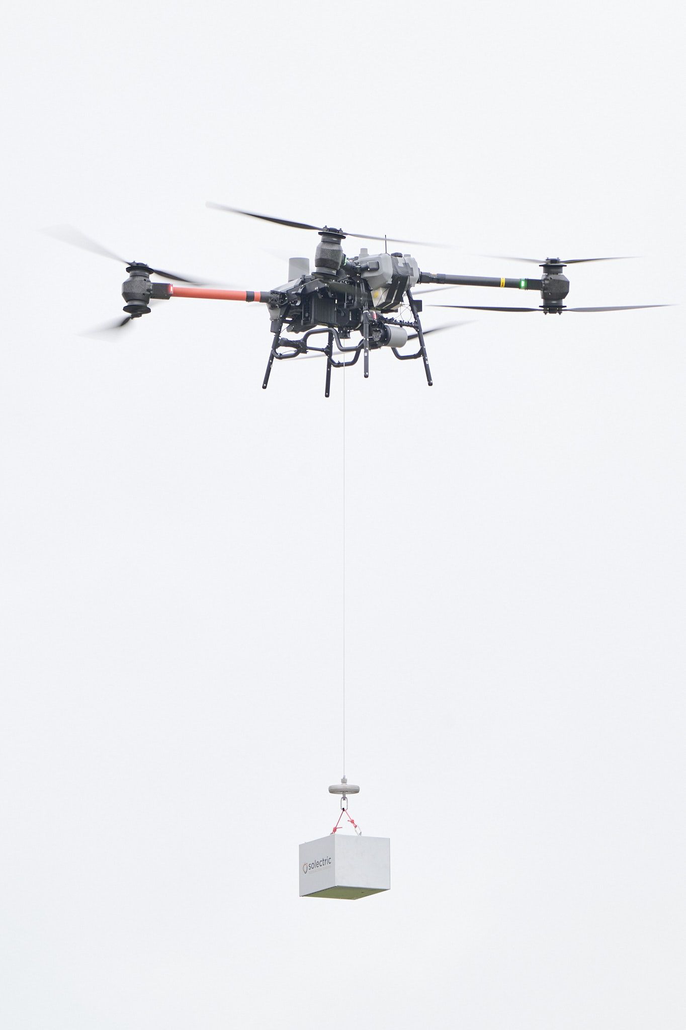 Drone from the Solectric team after picking up its load