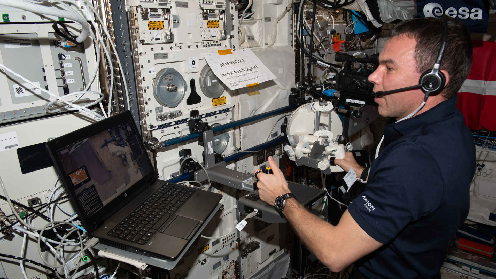 ESA astronaut Marcus Wandt controls a robotic arm from space