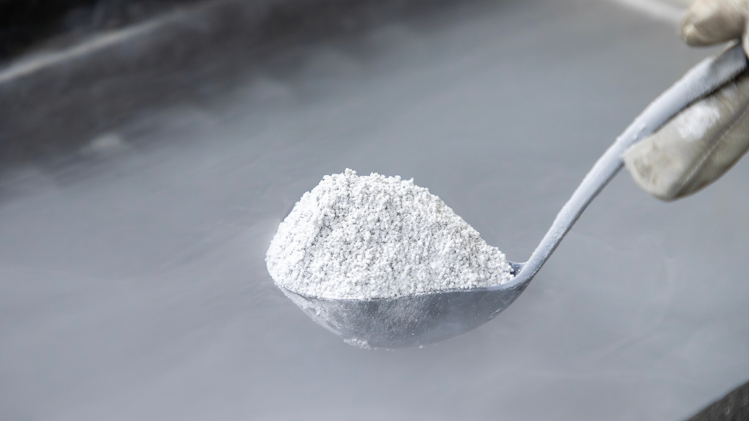 Ice-containing lunar dust (regolith)