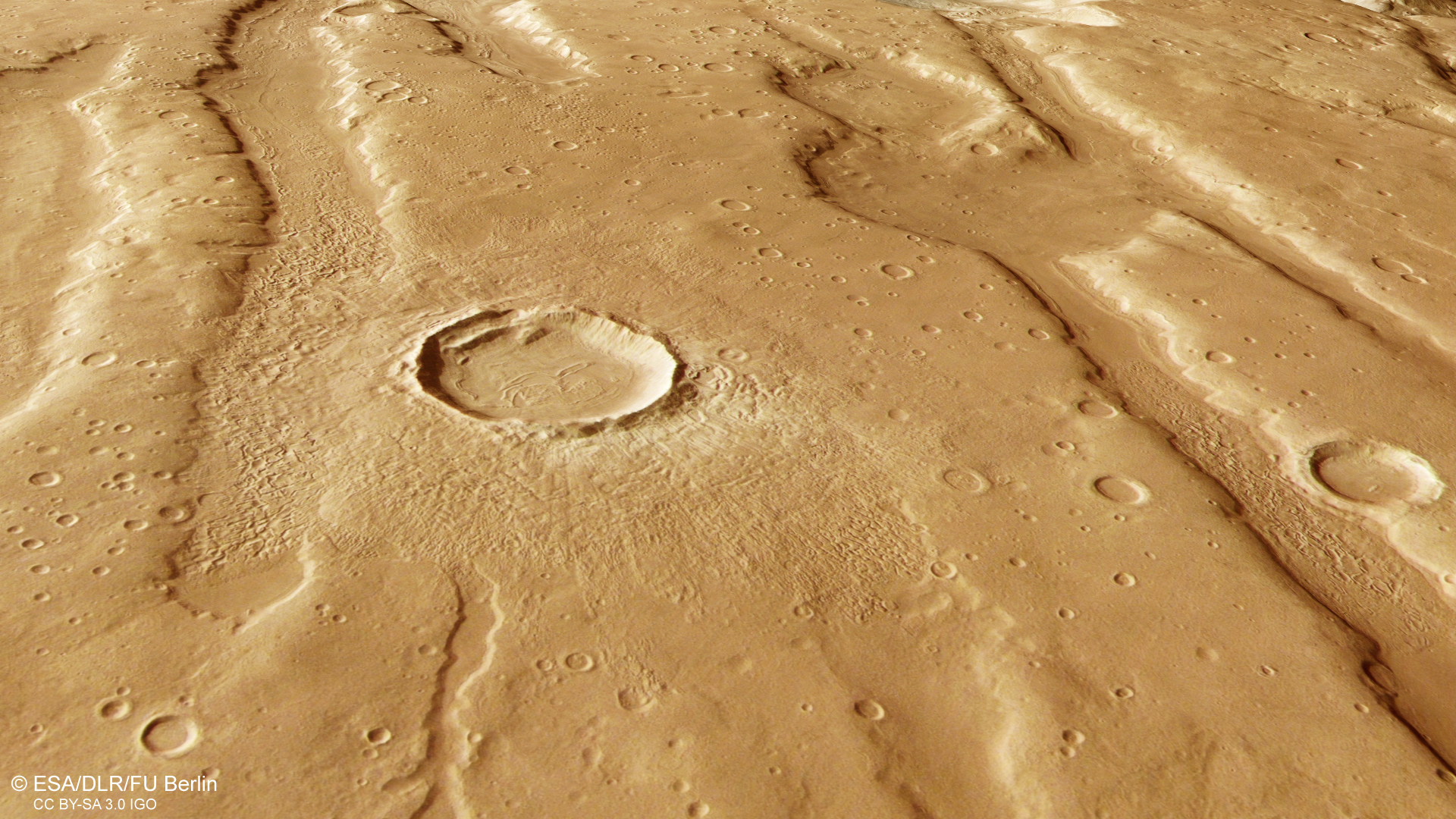Impact crater with ejecta blanket and evidence of ice