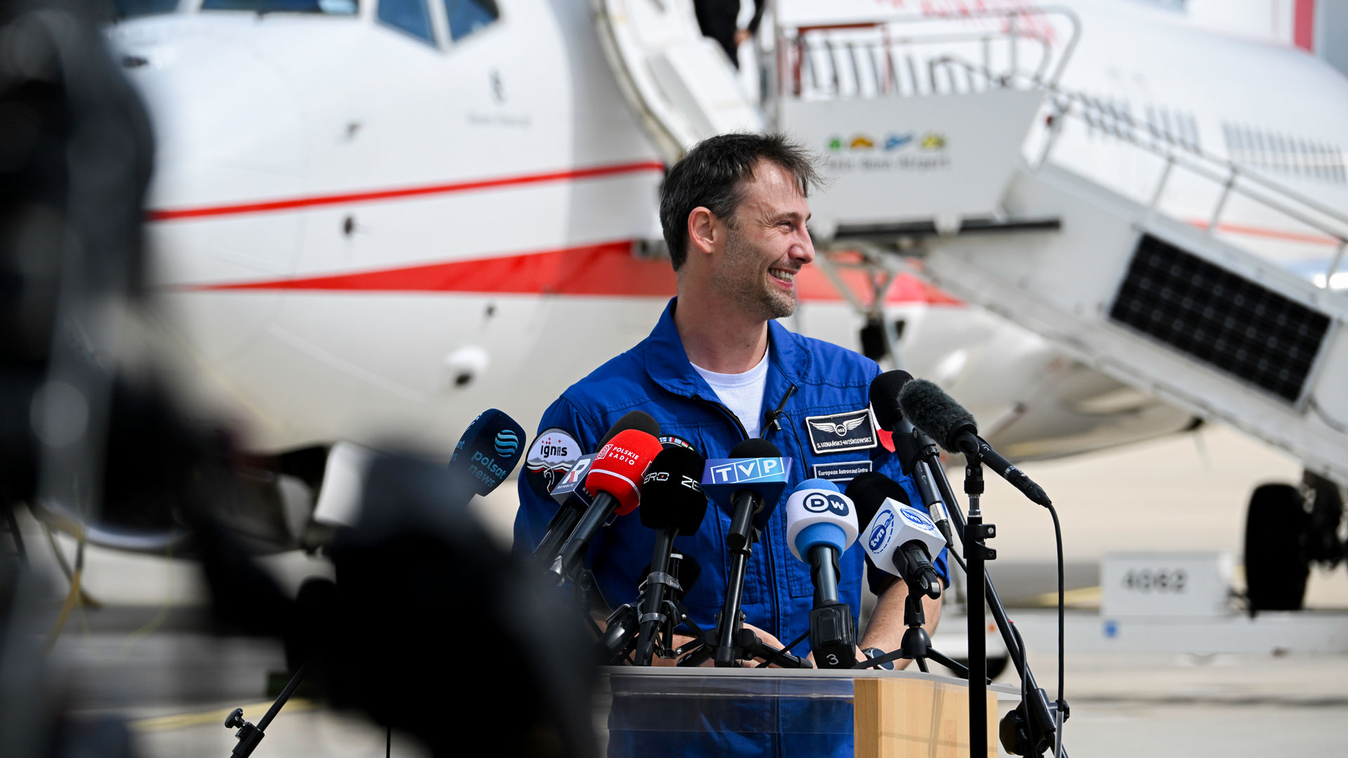 Arrival at the airport, one day after splashdown