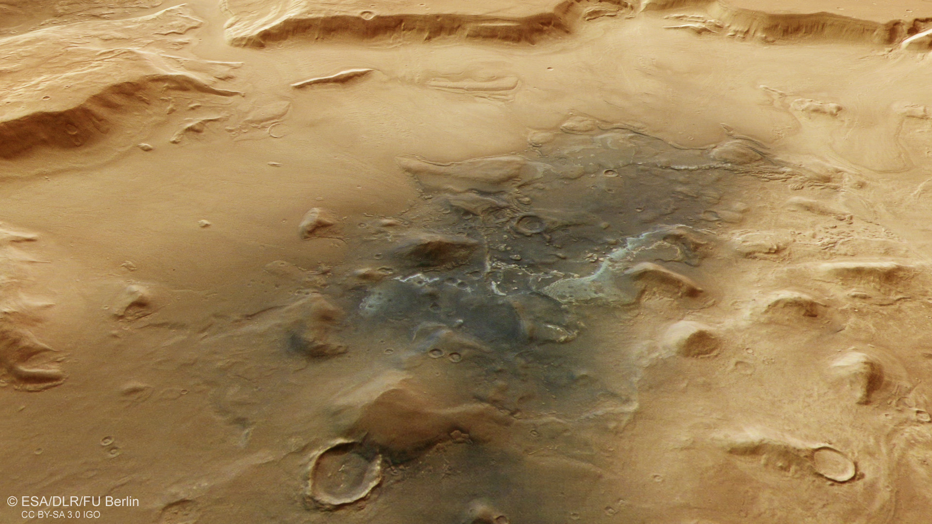 Volcanic dust and eroded hills in Deuteronilus Cavus