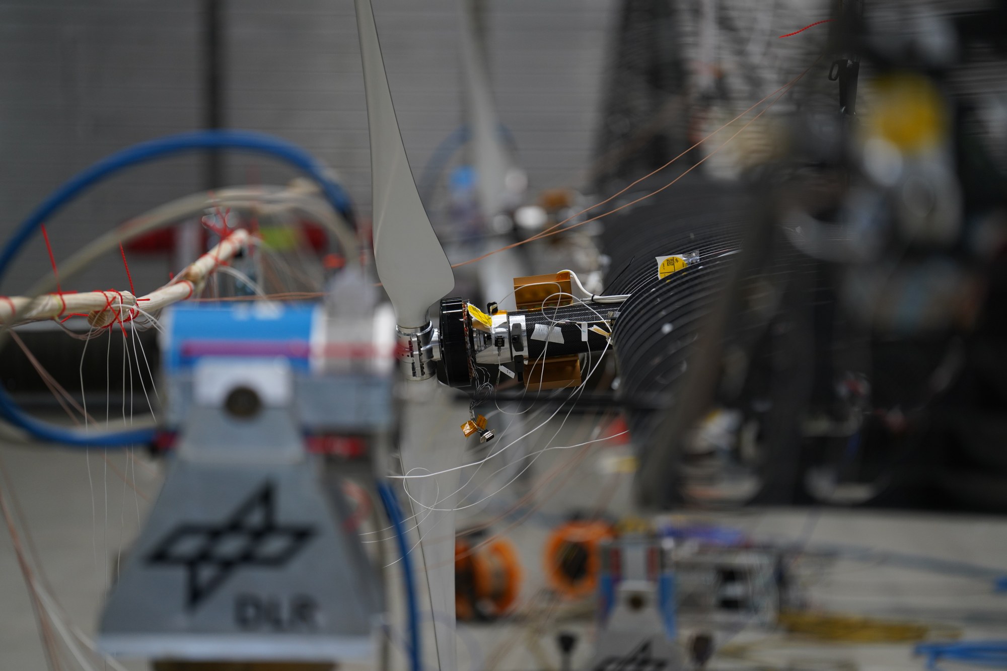 Vibration exciter in use during a test run on the wing