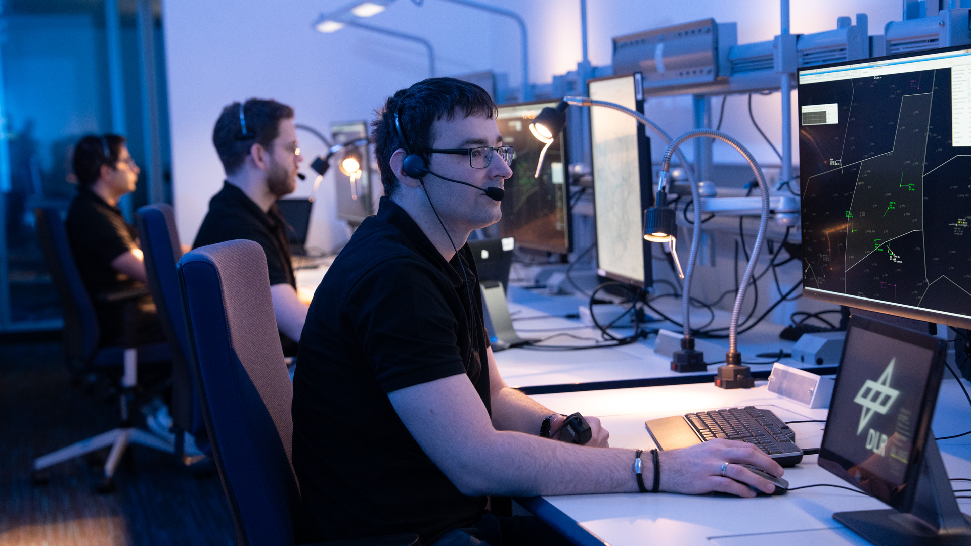 The DIRC digital air traffic controller works as part of a team with human air traffic controllers