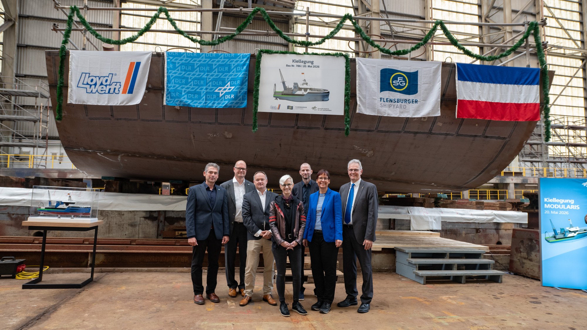 Representatives of DLR, Lloyd Werft, FSG Shipyard and Lloyd's Register at the keel-laying of MODULARIS