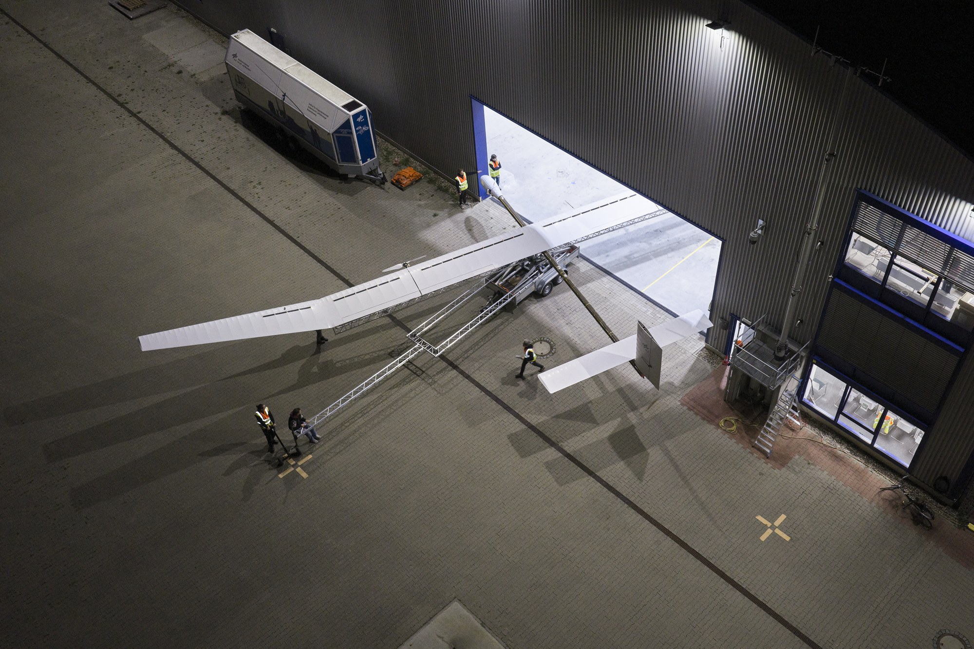 HAP-alpha leaves the hangar on a launch trolley