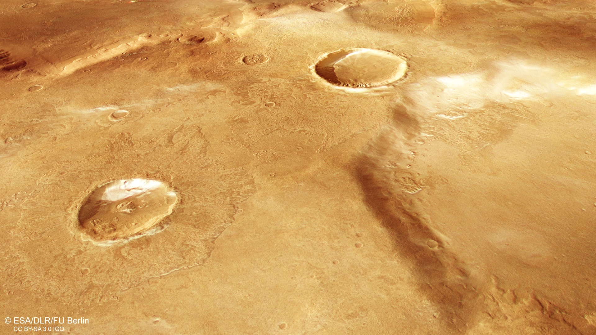 Martian crater with hoarfrost deposits along its southern rim