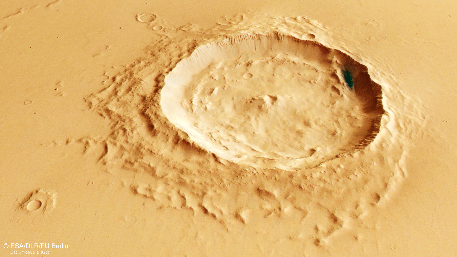 Perspective view of a relatively young crater north of Eumenides Dorsum