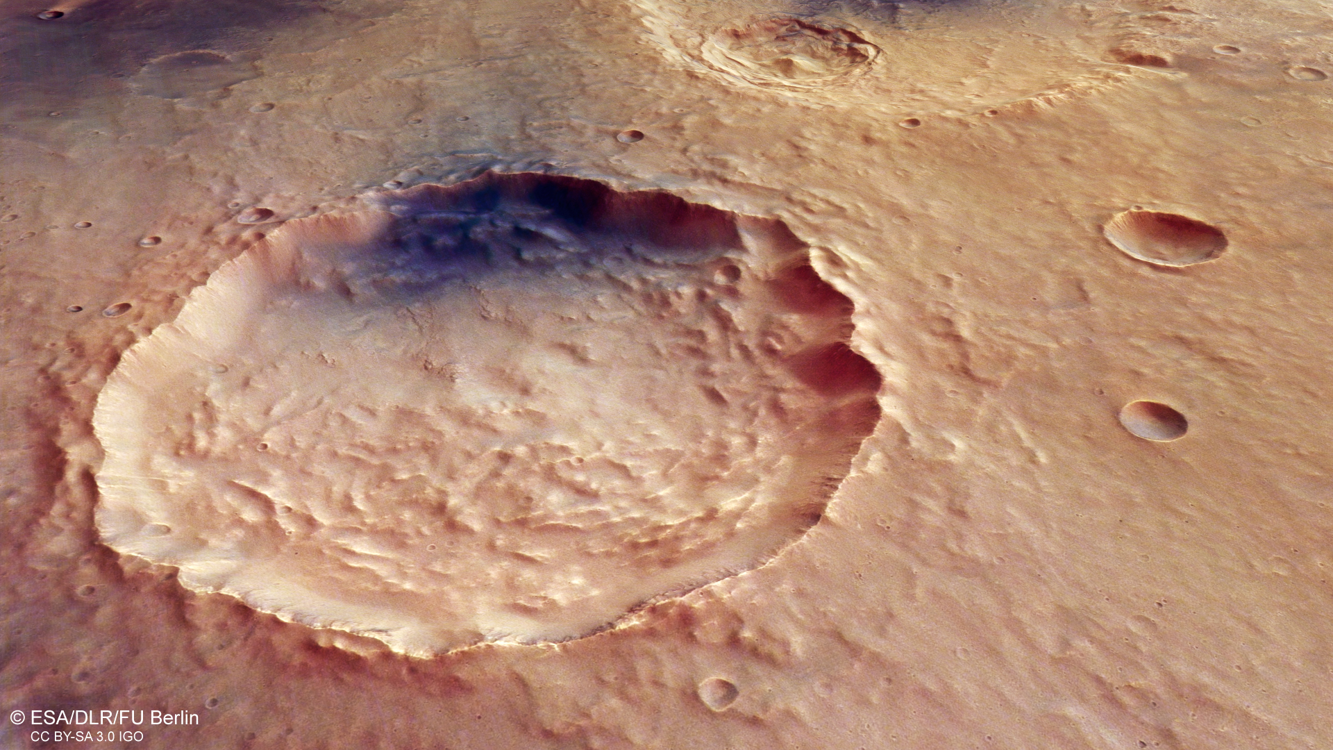 Dark, wind-blown deposits and landslides on Mars