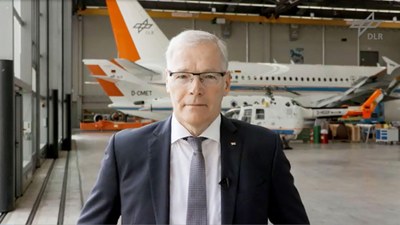 Video still of Rolf Henke at the German National Aeronautics Conference