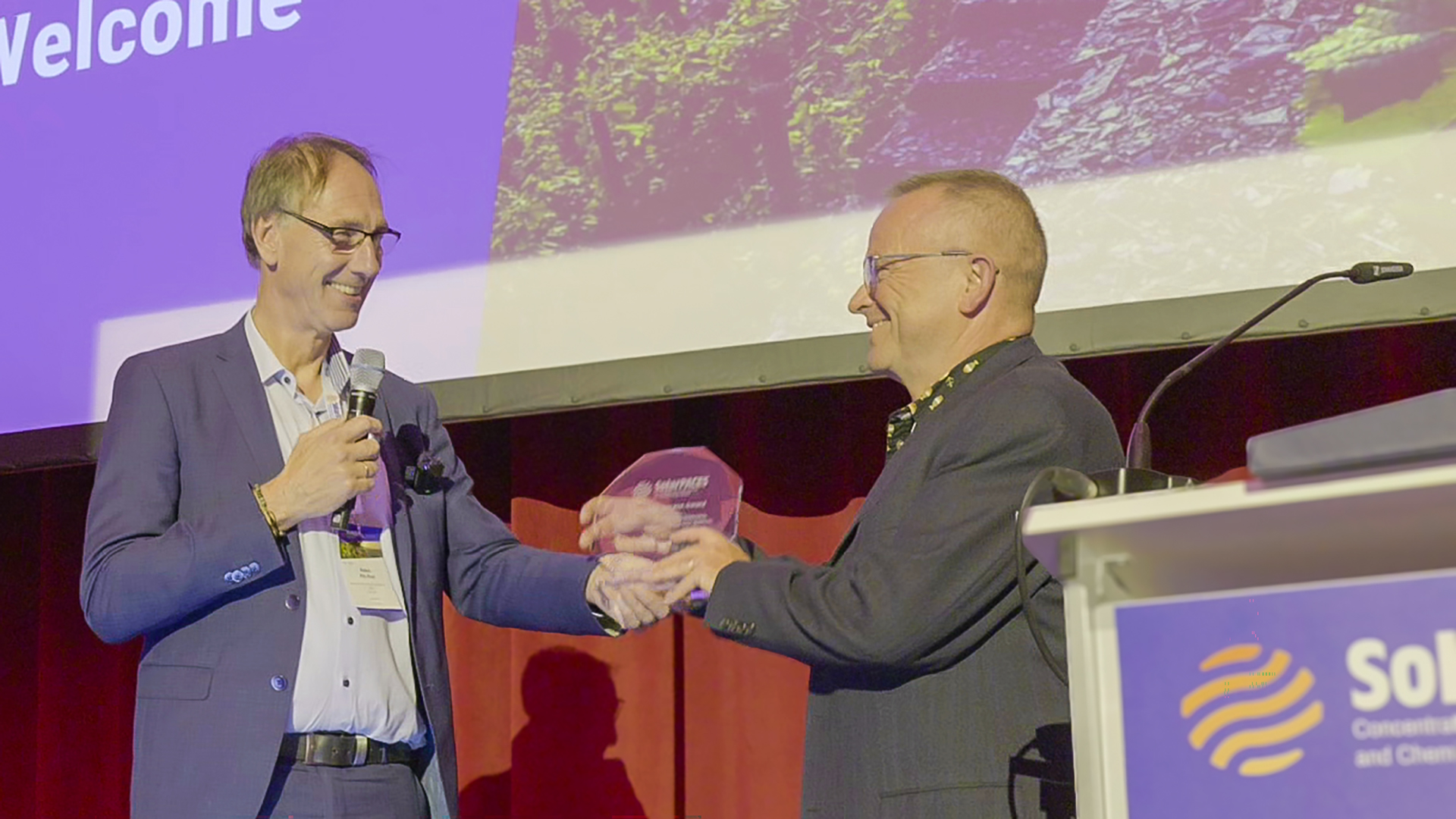 Presentation of the ‘Dedicated Service Award’ to Dr Christoph Richter