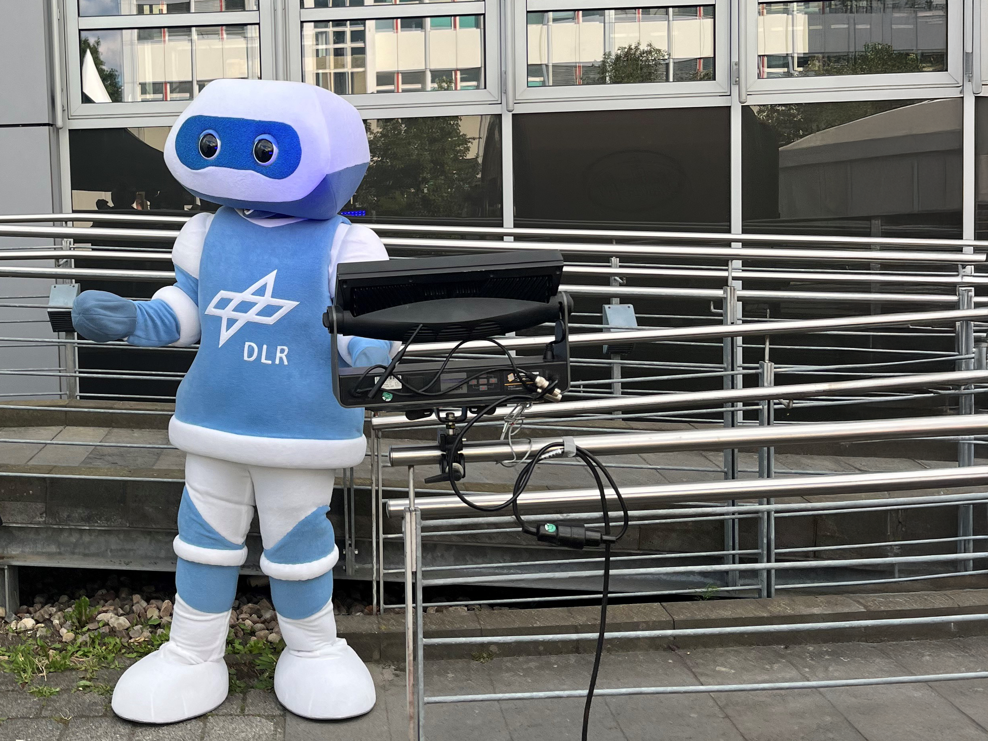 A human in a robot costume Arti.