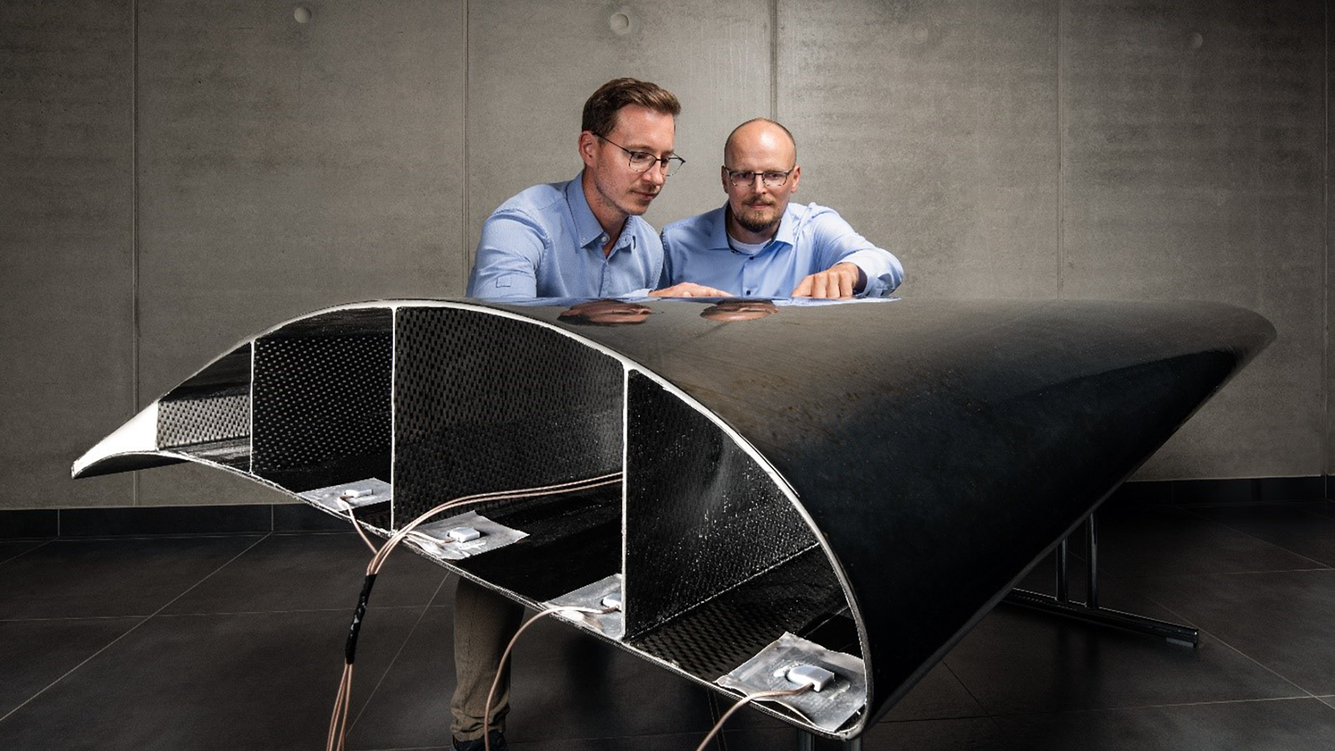 Two persons with model